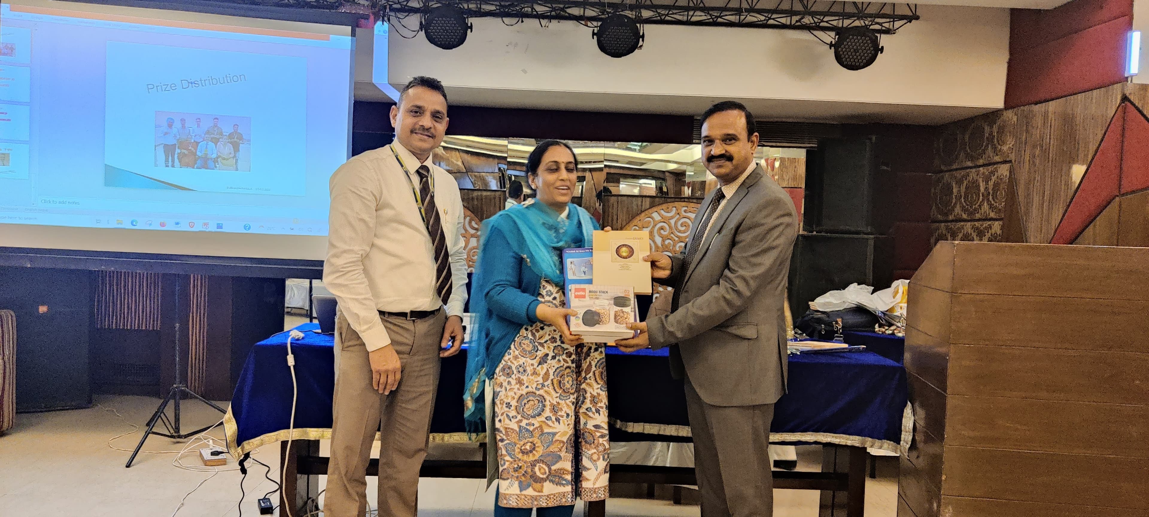 Mentor with advisor during recognition